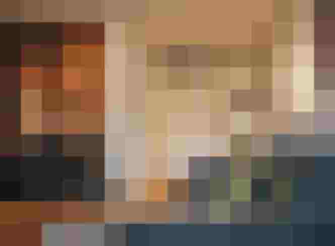 Modern junior suite with sofa and desk